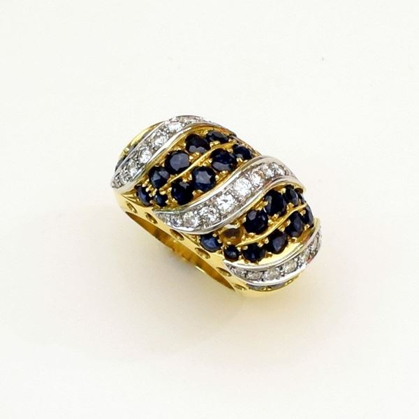 



ANELLO IN ORO GIALLO, ORO BIANCO KT 18 , DIAMANTI E ZAFFIRI 