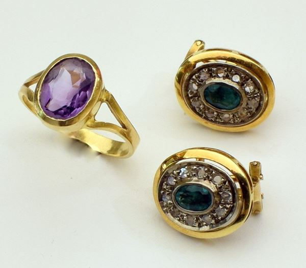 



ANELLO IN ORO 18KT E AMETISTA