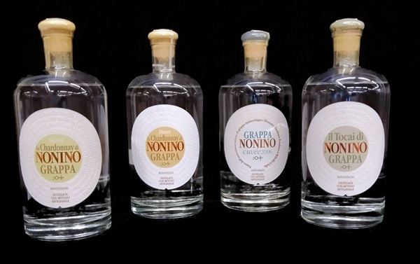 Quattro bottiglie di grappa Nonino,   - Asta GIOIELLI, ARGENTI, ARREDI, OGGETTI D'ARTE E DIPINTI - Poggio Bracciolini Casa d'Aste