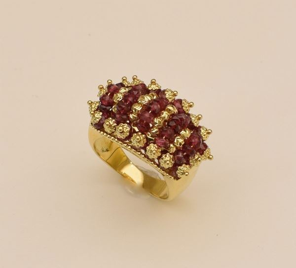 



ANELLO IN ORO GIALLO KT18 E PIETRE 
