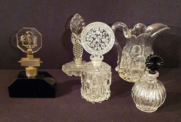 



Brocca e quattro bottiglie, anni 50-60  - Asta GIOIELLI, ARGENTI, ARREDI, OGGETTI D'ARTE E DIPINTI - Poggio Bracciolini Casa d'Aste