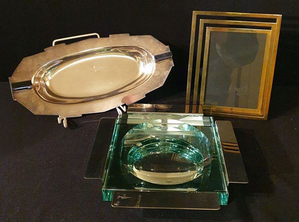 



Vassoio e cornice, art dec&ograve;  - Asta ANTIQUARIATO, COLLECTIBLES, GIOIELLI - Poggio Bracciolini Casa d'Aste