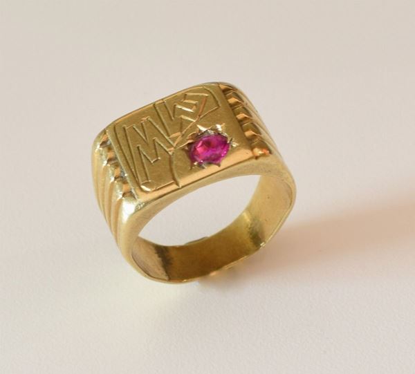 



ANELLO PER UOMO IN ORO KT18 E RUBINO