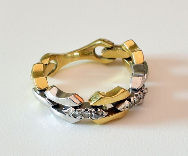 



ANELLO IN ORO GIALLO, ORO BIANCO E DIAMANTI