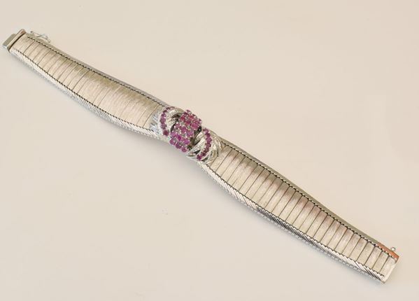 



BRACCIALE IN ORO BIANCO KT18 E RUBINI