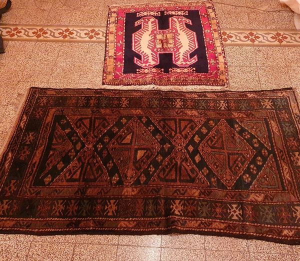 



Due tappeti persiani