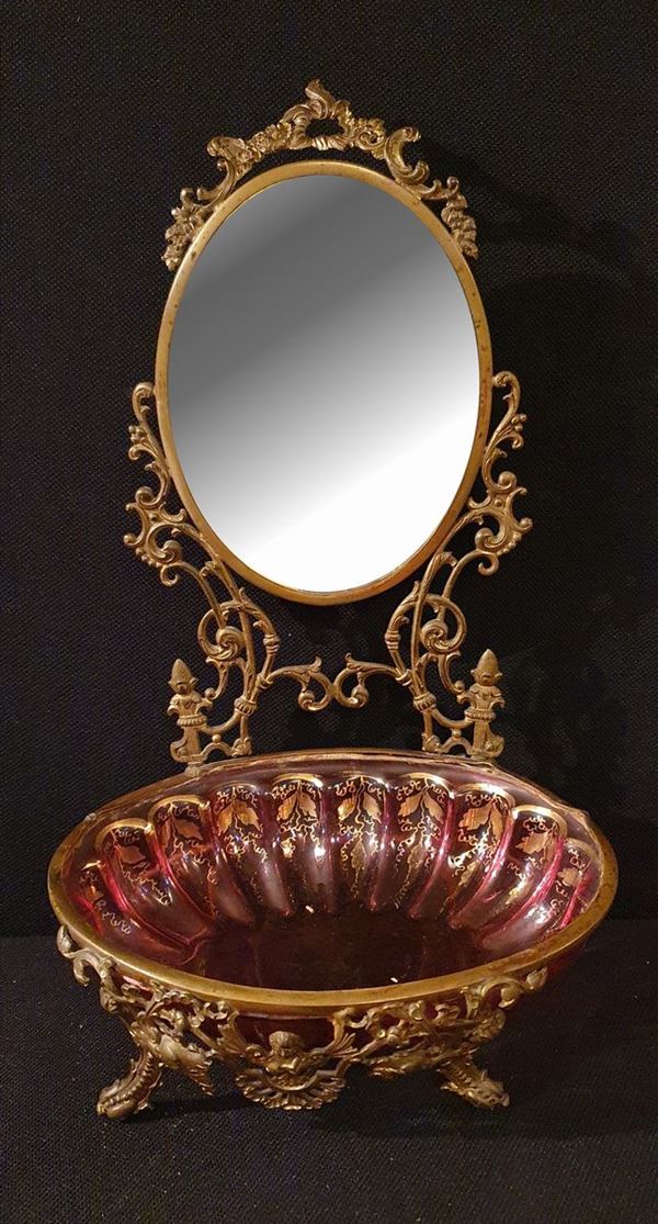 



Specchierina da tavolo, sec. XX  - Asta ANTIQUARIATO, COLLECTIBLES, GIOIELLI - Poggio Bracciolini Casa d'Aste