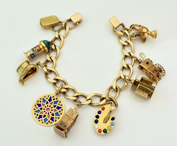 



BRACCIALE . FRANCIA IN ORO 14KT E CHARMS