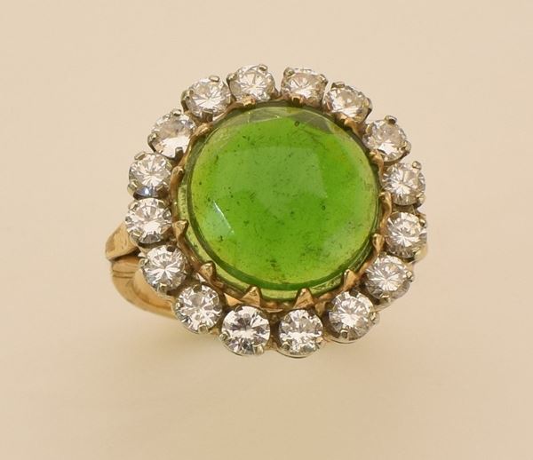 



ANELLO IN ORO 18KT, DIAMANTI E PIETRA 