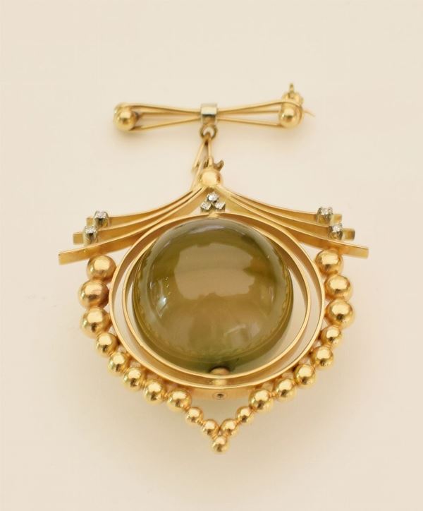 



SPILLA CON PENDENTE IN ORO 18KT E PIETRA