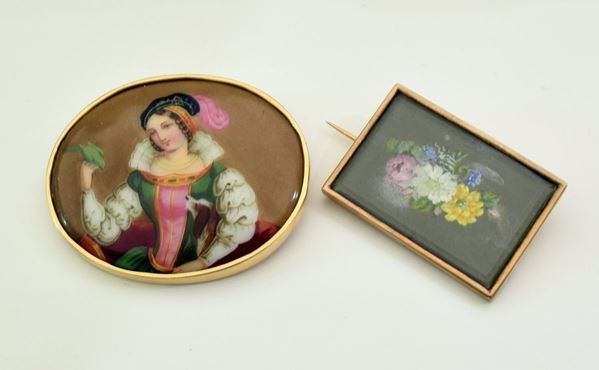 



SPILLA IN ORO 18KT CON MINIATURA 