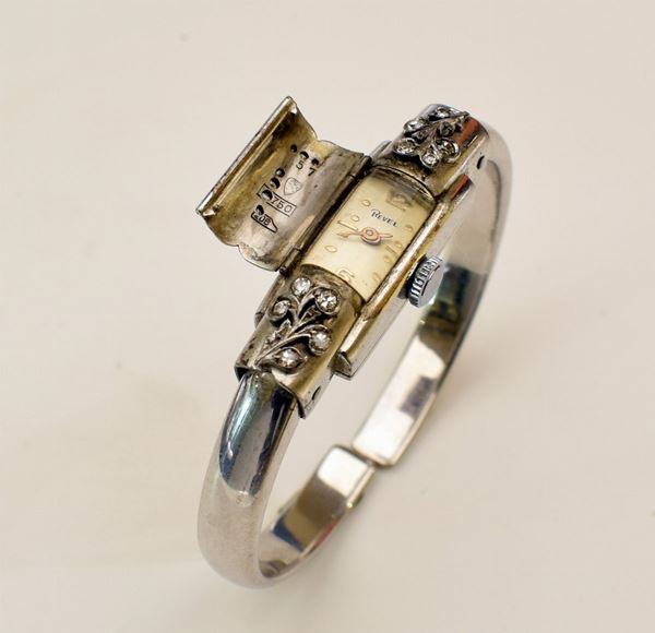 



OROLOGIO DA POLSO PER SIGNORA REVEL IN ORO 18KT E DIAMANTI