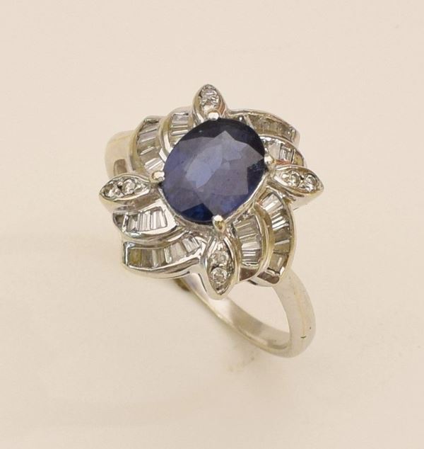 



ANELLO IN ORO BIANCO 18KT , DIAMANTI E ZAFFIRO