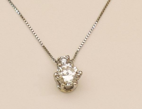



COLLANA PUNTO LUCE IN ORO 18KT E DIAMANTE