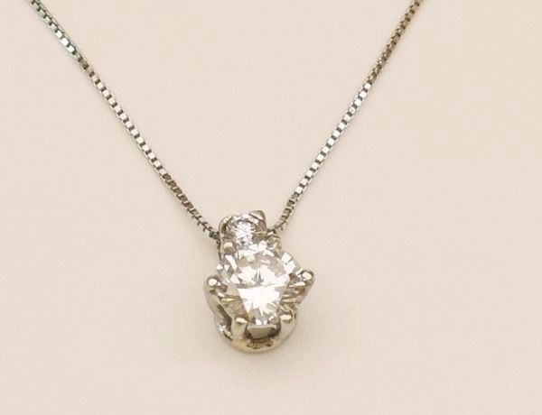 



COLLANA PUNTO LUCE IN ORO BIANCO KT 18 E DIAMANTE
