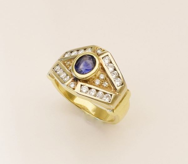 



ANELLO IN ORO GIALLO 18KT DIAMANTI E ZAFFIRO