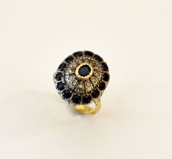 



ANELLO IN ORO 18 KT , ARGENTO , DIAMANTI E ZAFFIRI