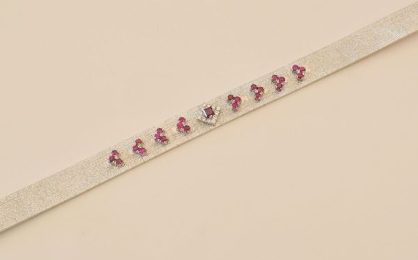 



BRACCIALE IN ORO BIANCO 18KT ,DIAMANTI E RUBINI