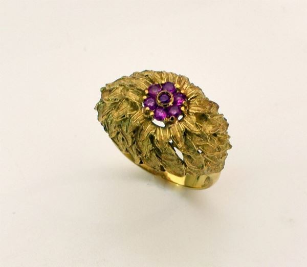 



ANELLO IN ORO 18KT E RUBINI