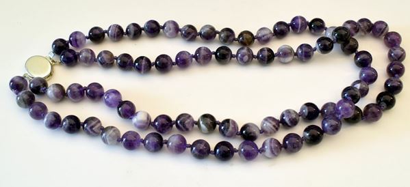 



COLLANA GIROCOLLO DI AMETISTE
