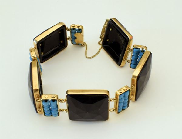 BRACCIALE IN ORO 18KT E PIETRE 
