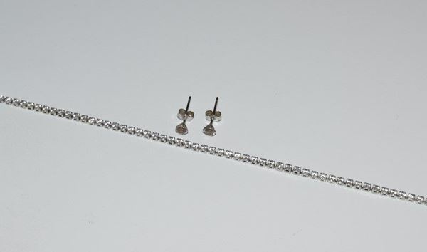 



BRACCIALETTO TENNIS E PAIO DI ORECCHINI IN ORO 18KT E PIETRE
