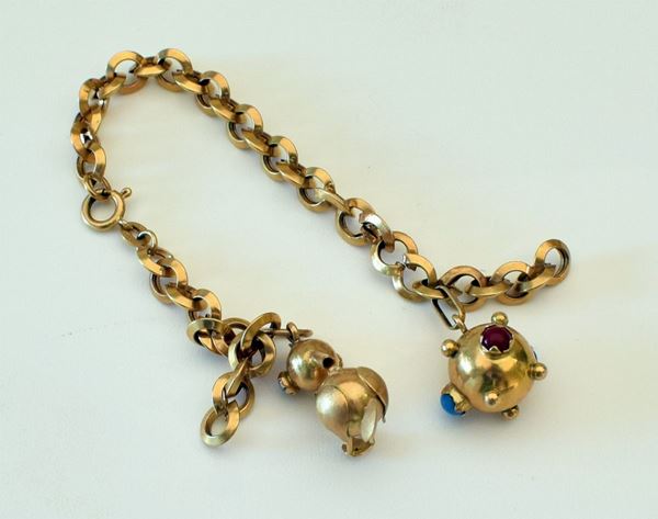 



BRACCIALETTO IN ORO 18KT E DUE CHARMS