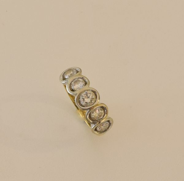 



ANELLO IN ORO GIALLO , ORO BIANCO E DIAMANTI