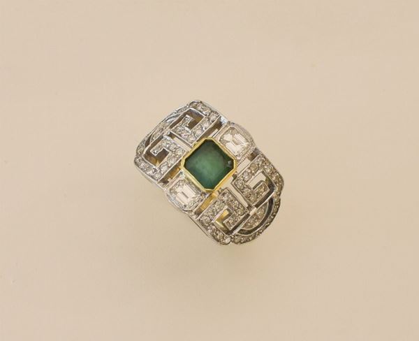 



ANELLO IN ORO GIALLO, ORO BIANCO 18KT E DIAMANTI E SMERALDO