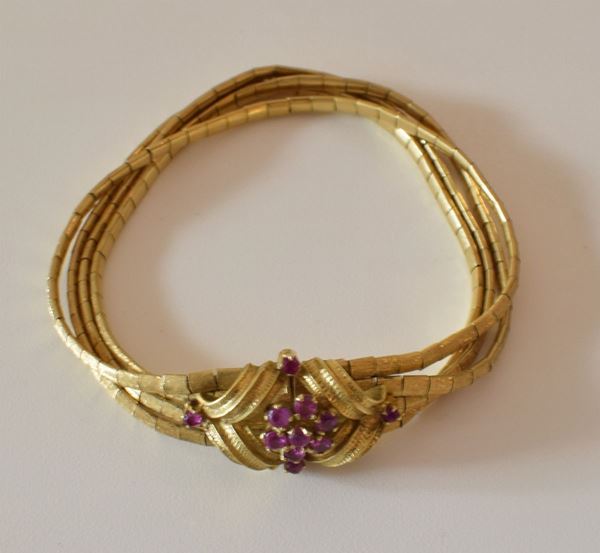 BRACCIALE IN ORO GIALLO 18KT E RUBINI
