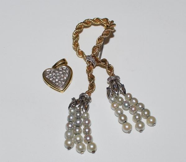



SPILLA IN ORO GIALLO,ORO BIANCO 18KT DIAMANTI E PERLE