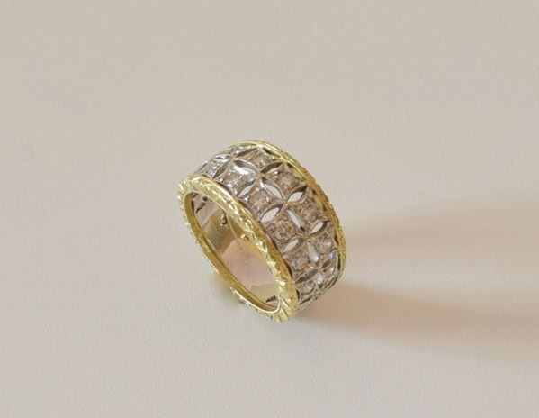 



ANELLO IN ORO GIALLO, ORO BIANCO 18KT E DIAMANTI