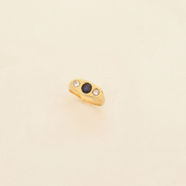 



ANELLO IN ORO GIALLO 18KT, DIAMANTI E ZAFFIRO