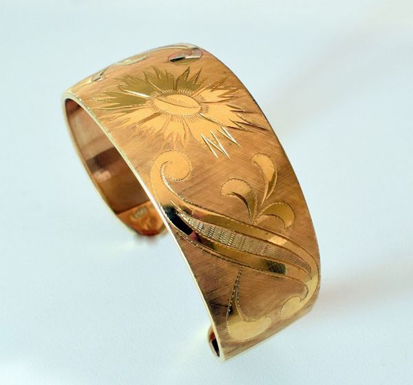 BRACCIALE RIGIDO IN ORO GIALLO 18KT