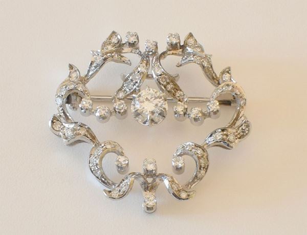 



SPILLA IN ORO BIANCO 18KT E DIAMANTI