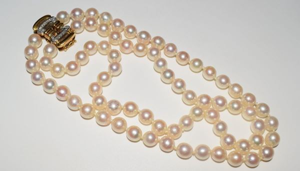 



COLLANA GIRCOCOLLO IN ORO 18KT E PERLE