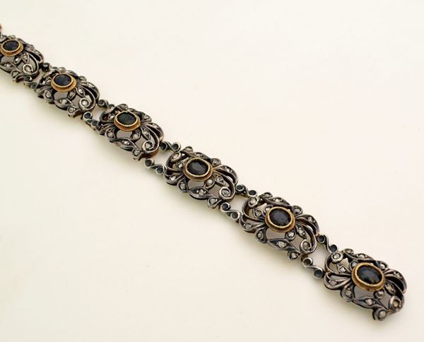 



BRACCIALE IN ORO, ARGENTO , DIAMANTI E ZAFFIRI 