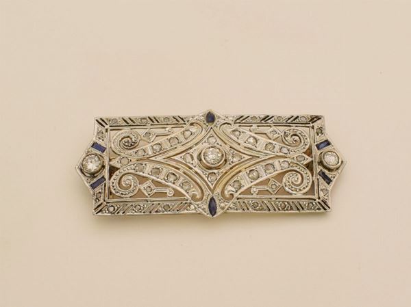 



SPILLA IN ORO BIANCO 18KT DIAMANTI E ZAFFIRI  - Asta GIOIELLI, ARGENTI E MONETE - Poggio Bracciolini Casa d'Aste