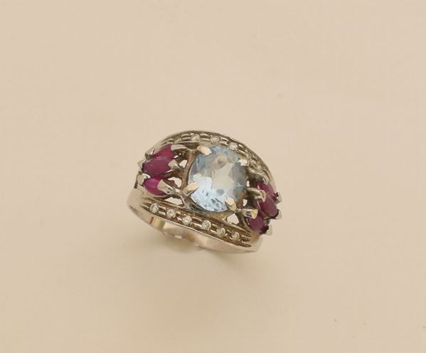 



ANELLO IN ORO BIANCO 18KT PIETRA SINTETICA E RUBINI