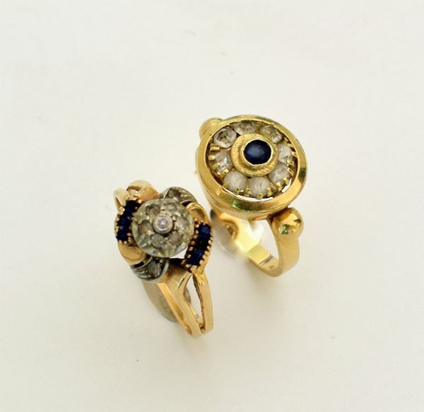 



DUE ANELLI IN ORO GIALLO 18KT E PIETRE