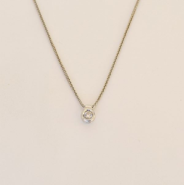



COLLANA&nbsp; GIROCOLLO , PUNTO LUCE IN ORO BIANCO 18KT&nbsp; E&nbsp; DIAMANTE