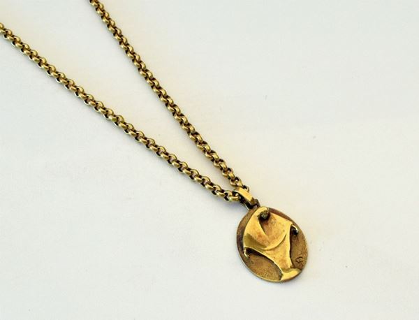 



COLLANA CON PENDENTE