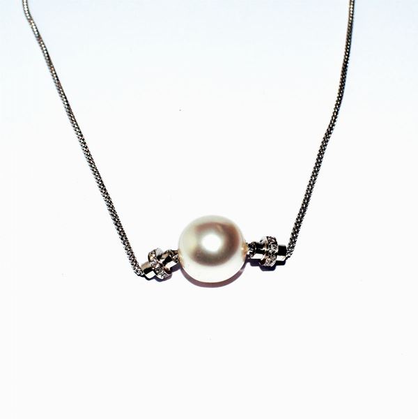 



COLLANA IN ORO BIANCO 18KT , PERLA E DIAMANTI