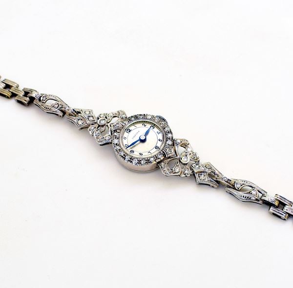 



OROLOGIO DA POLSO PER SIGNORA ORFINA IN ORO 18KT E DIAMANTI