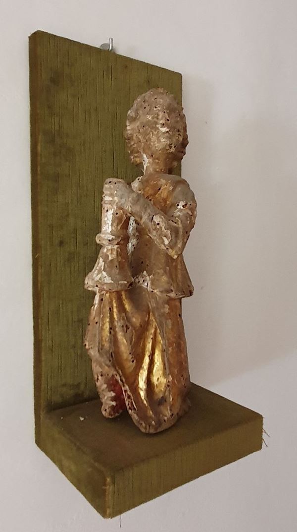 Piccolo angelo reggicero, Toscana, secolo XVII