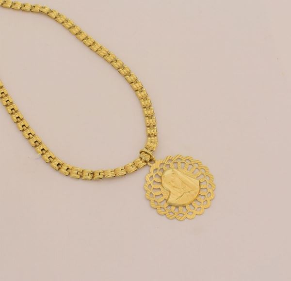 



COLLANA GIROCOLLO IN ORO GIALLO 18KT CON PENDENTE