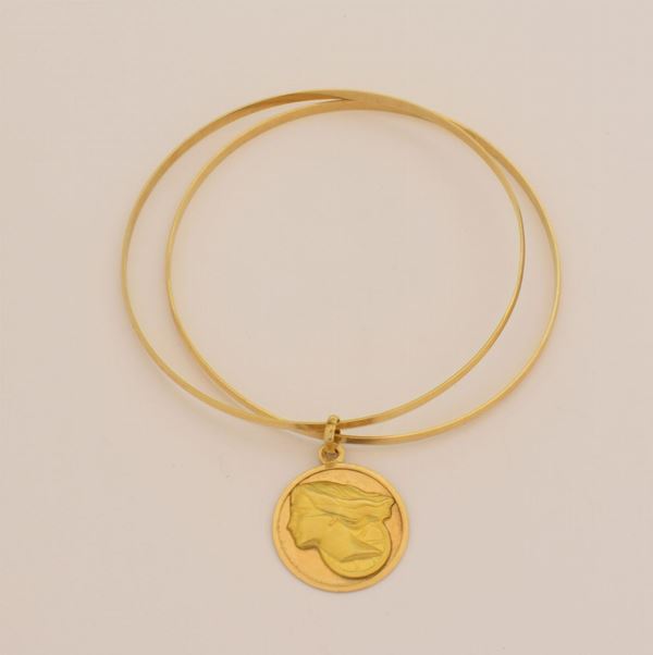 



BRACCIALE IN ORO GIALLO 18 KT E PENDENTE