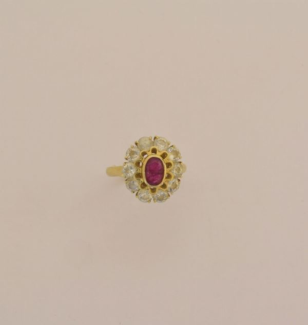 ANELLO IN ORO GIALLO 18KT E PIETRE