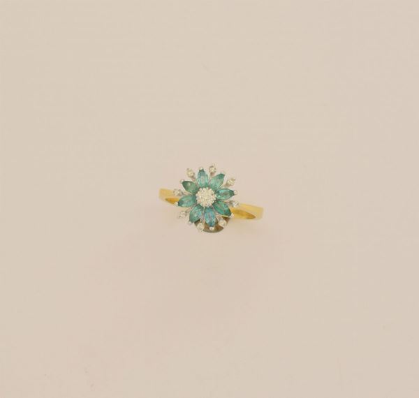 



ANELLO IN ORO 18KT , DIAMANTI E SMERALDI
