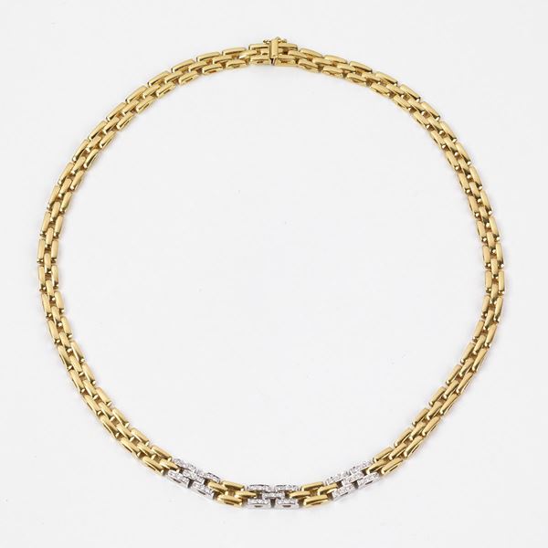 



COLLANA GIROCOLLO IN ORO GIALLO, ORO BIANCO 18KT E DIAMANTI